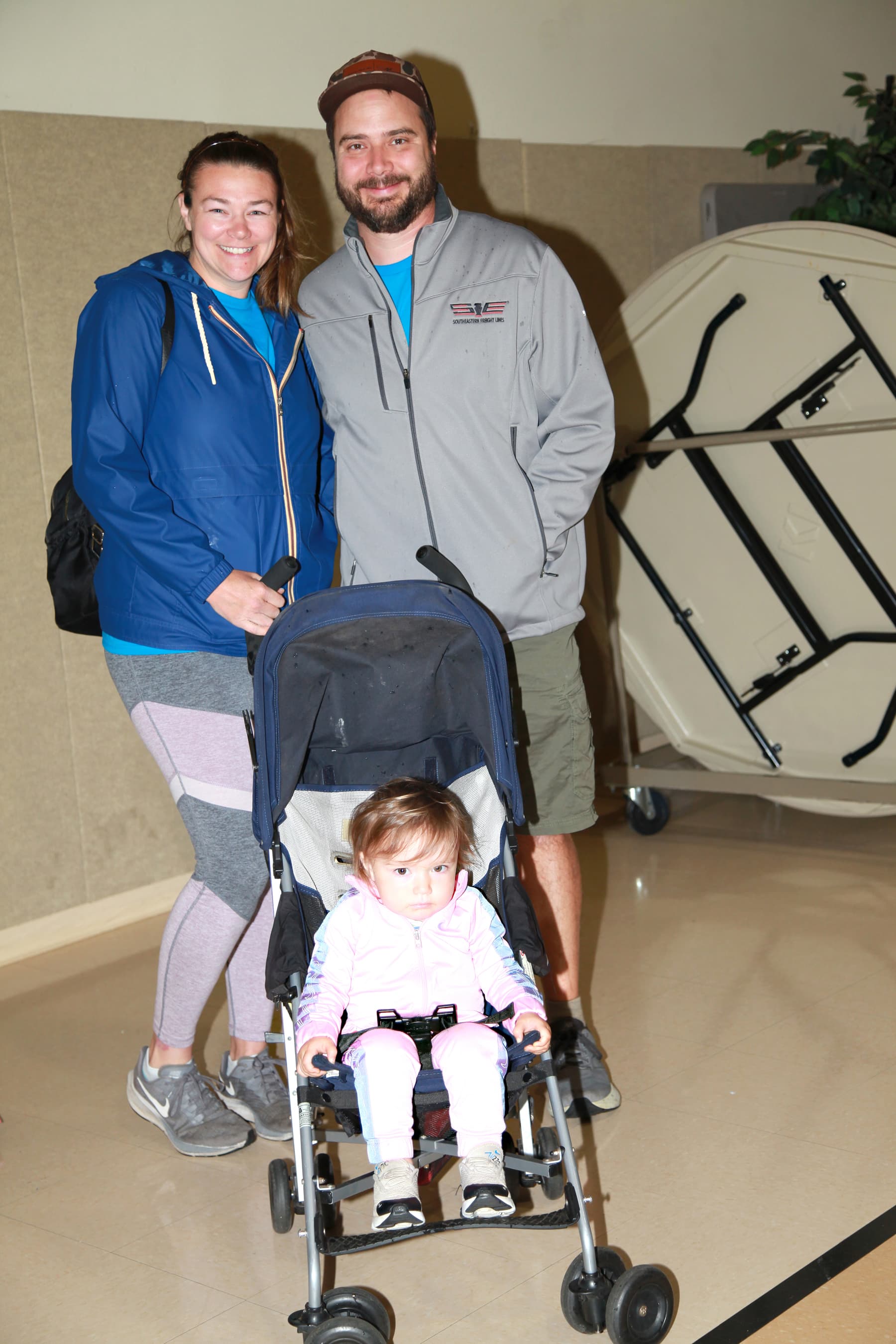 A family with a toddler in a stroller at Bike4Life