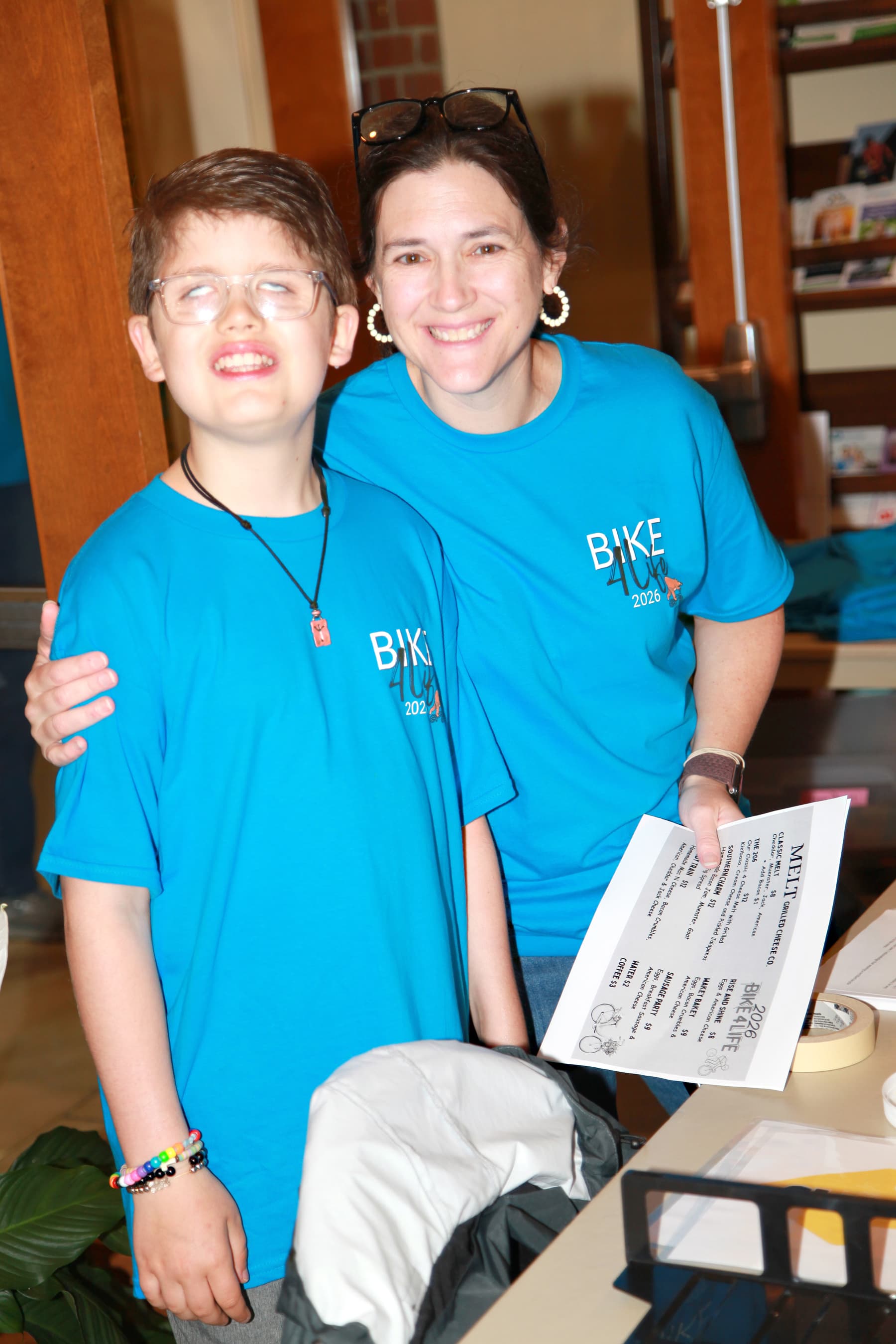 Bike4Life riders at a sponsor's food table